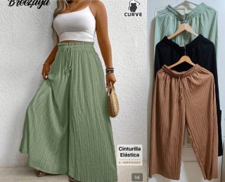 Pantalones negros con detalles 5,8 y 10€