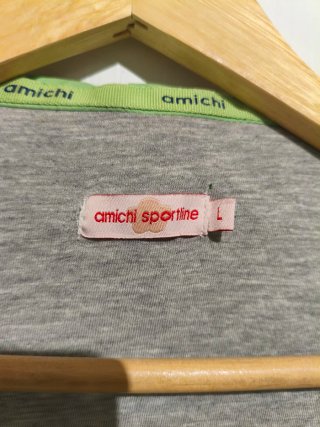 Chaqueta Amichi verde mujer tipo chubasquero