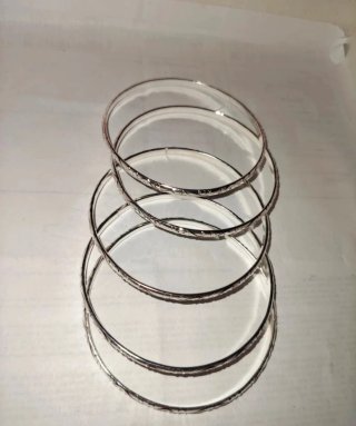 5 Brazaletes Plateados con Diseño
