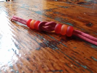 Braccialetto corda con perline sfumate