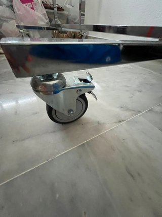 Burro de ropa metálico