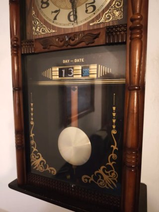 Reloj de péndulo antiguo