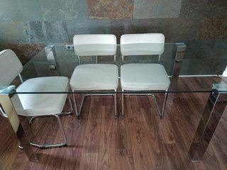 Mesa de cristal con 6 sillas