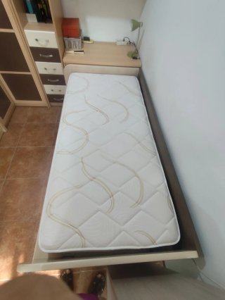 Cama de madera estilo nido con cajones