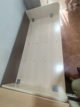 Cama de madera estilo nido con cajones