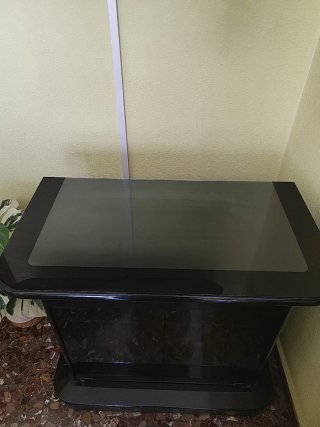 Mueble TV negro de cristal giratorio
