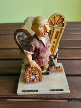 Statuetta decorativa da uomo per sostenere libri
