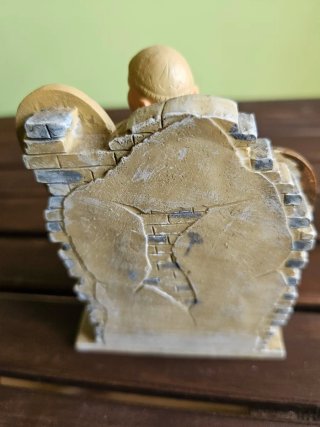 Statuetta decorativa da uomo per sostenere libri