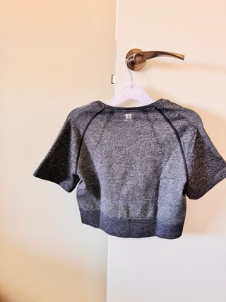 Top deportivo gris domyos