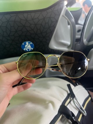 Gafas de sol Ray-Ban doradas y marrones