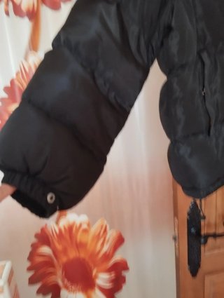 Plumífero negro talla M sin usar.