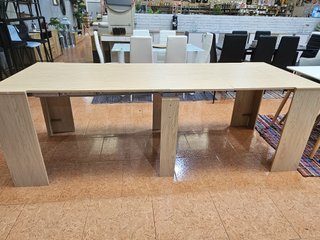 Mesa de comedor extensible de madera
