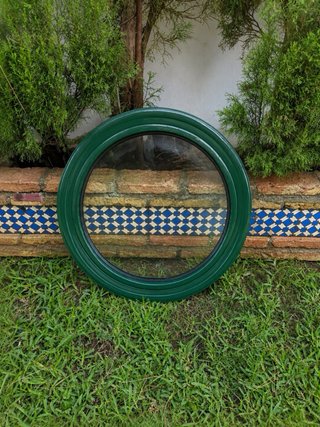 Ventana ojo de buey fija y reja