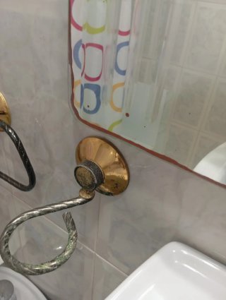 Espejo de lavabo de cristal y metal