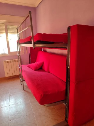 Sofá cama rojo tela