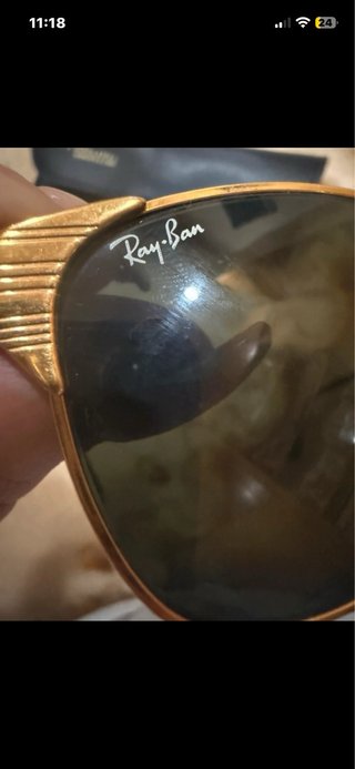 Gafas de sol Ray-Ban doradas y verdes