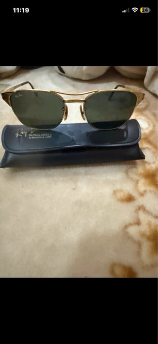Gafas de sol Ray-Ban doradas y verdes