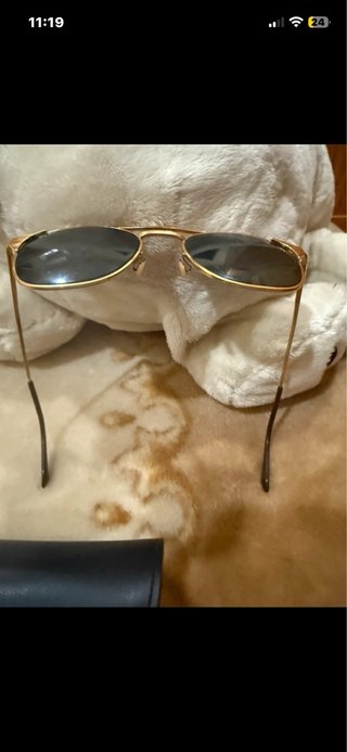 Gafas de sol Ray-Ban doradas y verdes