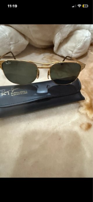 Gafas de sol Ray-Ban doradas y verdes