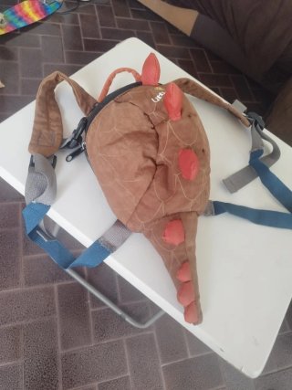 Mochila infantil dinosaurio con capucha