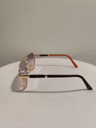 Gafas de sol Cartier doradas con lentes degradado