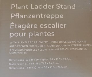 Estantería de madera blanca para plantas