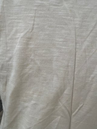 Camiseta boho blanca con crochet y flecos