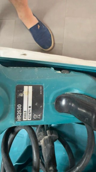 Taladro percutor Makita con maletín