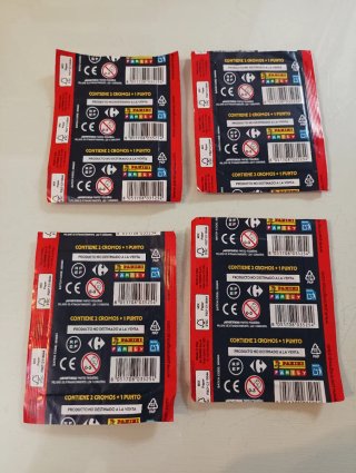 23 cromos Mundial + 4 sobres Carrefour