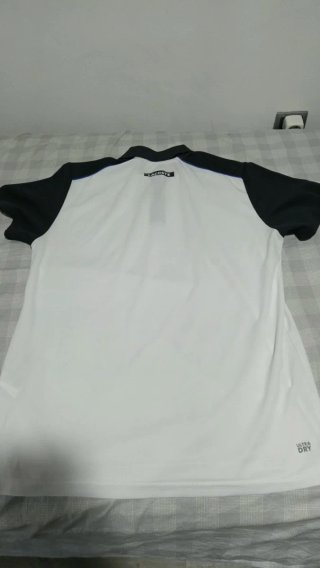Polo Lacoste Blanco y Negro