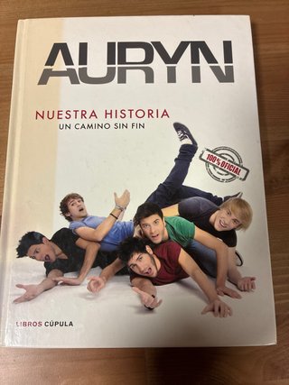 CDs, libros y pulsera AURYN