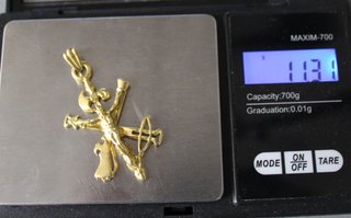 Colgante de oro de 18k. Peso: 11.31 gr.