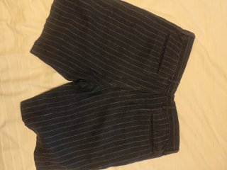 Pantalón corto de lino a rayas