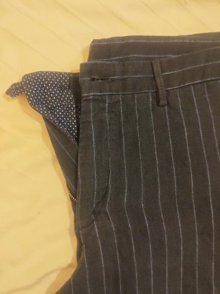 Pantalón corto de lino a rayas