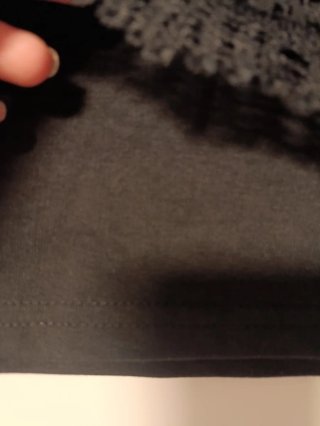 Falda corta de encaje negra talla 42