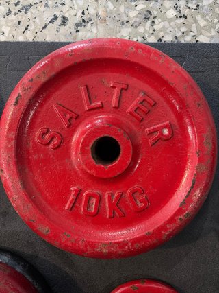 Discos de pesas para gimnasio. Barra de 28mm