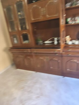 Mueble de salón madera y cristal