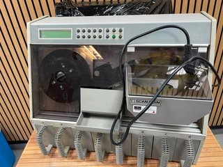Máquina contadora y clasificadora de moneda