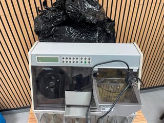 Máquina contadora y clasificadora de moneda