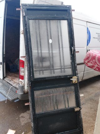 Puerta de hierro con rejas 90x230