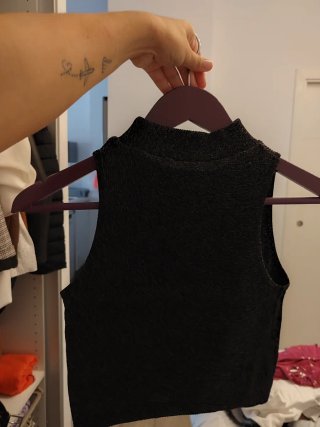 Chaleco negro brillante