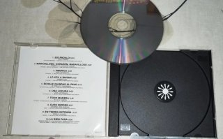 CD Raphael: Escándalo / En tierra extraña