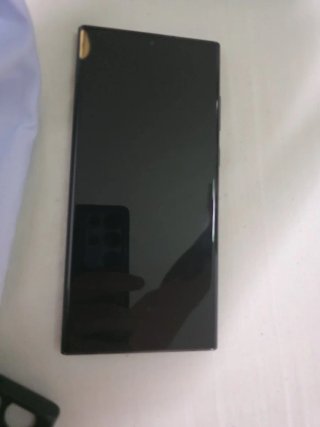 Samsung S22 Ultra con funda Naruto