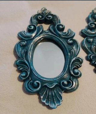 Pareja de espejos decorativos antiguos