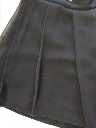Falda negra plisada talla S