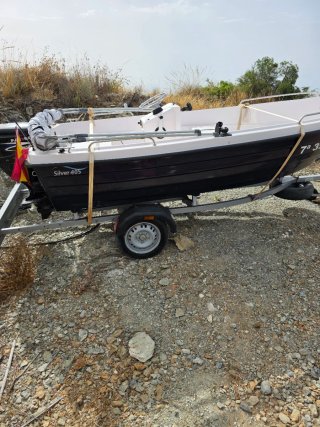 Barco con remolque  buen estado 15 cv parsun
