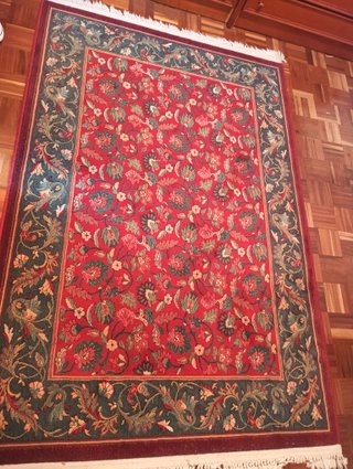 Tappeto di lana in perfetto stato con design floreale