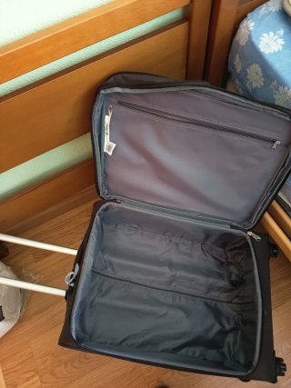 Maleta de viaje ORALLI negra y naranja Mediana