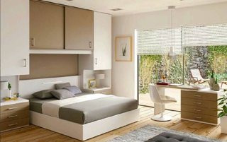 Dormitorio de matrimonio con armario puente a med