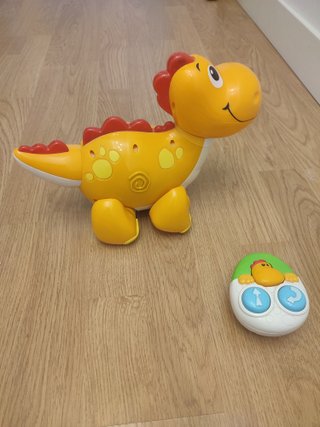 Dinosaurio teledirigido musical